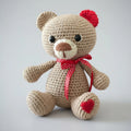 Handmade Crochet Teddy Bear – Valentine Crochet Animal Toy with Heart Feet & Red Bow